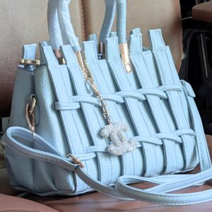 Light blue leather handbag with charm